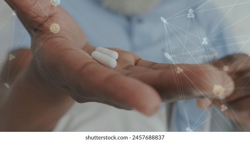 Image of data processing over senior african american man with pills. Global business and digital interface concept digitally generated image.
