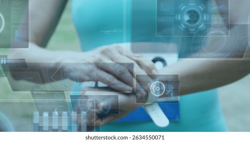 Image of data processing over sportswoman checking smartwatch. Global sport and digital interface concept digitally generated image. - Powered by Shutterstock - Get 15% off with code: PIKWIZARD15