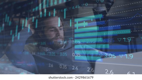 Image of data processing over tired caucasian businessman using laptop. global networks, business, data processing and digital interface concept digitally generated image. - Powered by Shutterstock