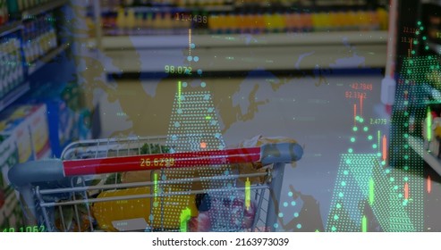 Image of data processing over trolley in shop. global business, shopping and digital interface concept digitally generated image.
