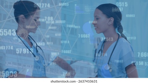 Image of data processing over two diverse doctors. Global medicine, technology, data processing and digital interface concept digitally generated image.