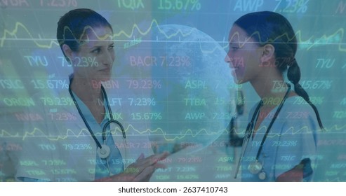 Image of data processing over two diverse doctors. Global medicine, technology, data processing and digital interface concept digitally generated image.