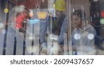 Image of data processing over woman and men using tablet working in warehouse shipping centre. global shipping, delivery and online shopping concept digitally generated image.