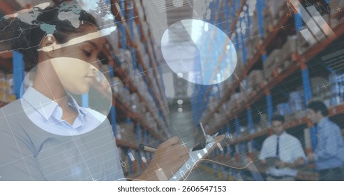 Image of data processing over woman writing on clipboard in warehouse. global shipping, delivery and connections concept digitally generated image.