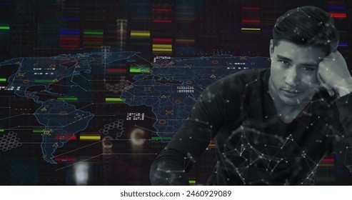 Image of data processing over world map and worried biracial man. Global data processing, computing and connections concept digitally generated image.