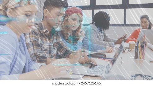 Image of data processing and padlock icon over diverse business people in office. Global business and digital interface concept digitally generated image.