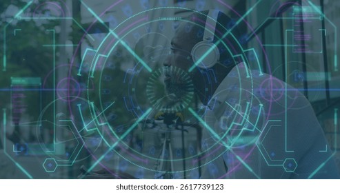 Image of data processing and scope scanning over african amercian businessman. global business, computing and digital interface concept digitally generated image.