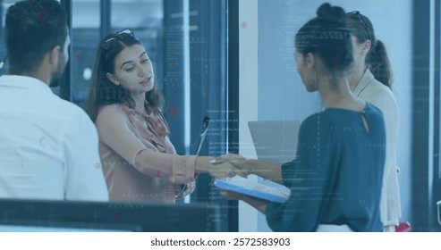 Image of data processing and shapes over diverse colleagues shaking hands. Global business, teamwork and digital interface concept digitally generated image. - Powered by Shutterstock - Get 15% off with code: PIKWIZARD15
