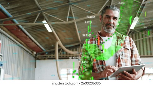 Image of data processing statistics over smiling casually dressed man using digital tablet. global digital network digitally generated image.