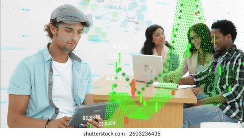 Image of data processing statistics over man using a digital tablet in a casual office. global digital communication network digitally generated image.