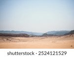 Image of the desert and mountains on the Sinai Peninsula at sunset. The Sinai Desert is an attraction accessible to vacationers of all resort areas of Charm. excursion in Egypt. Tourist attraction