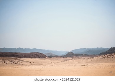 Image of the desert and mountains on the Sinai Peninsula at sunset. The Sinai Desert is an attraction accessible to vacationers of all resort areas of Charm. excursion in Egypt. Tourist attraction - Powered by Shutterstock