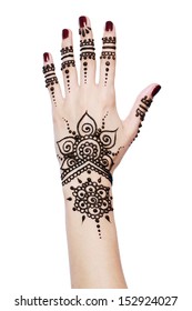 Image detail of henna being applied to hand isolated over white