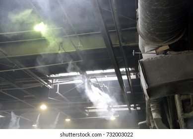 Image of devastated near future world, Old factory where steam is coming out of piping
