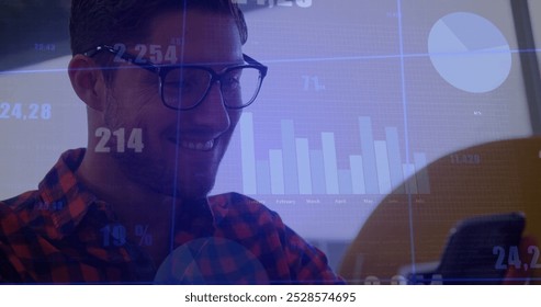 Image of diagrams and data processing over white businessman using smartphone. Global business, technology and digital interface concept digitally generated image.