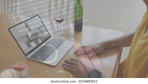 Image of diagrams and data processing over biracial man having image call with friend. Friendship, technology and digital interface concept digitally generated image.