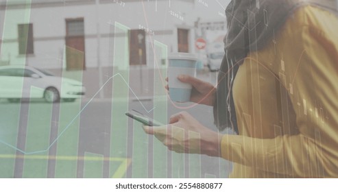 Image of diagrams and data processing over caucasian woman using smartphone in city. Business, technology and digital interface concept digitally generated image. - Powered by Shutterstock