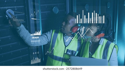 Image of diagrams and data processing over biracial workers in server room. Technology and digital interface concept digitally generated image.