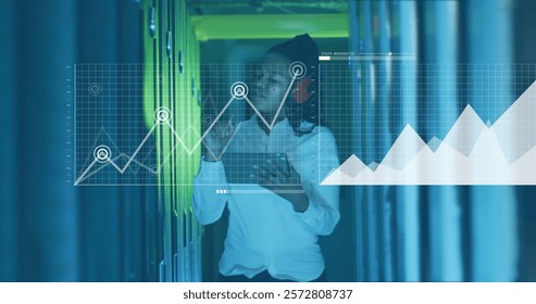 Image of diagrams and data processing over biracial female worker in server room. Technology and digital interface concept digitally generated image.