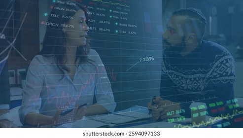 Image of diagrams and stock market over diverse colleagues discussing work. Global business and digital interface concept digitally generated image.