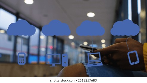Image of digital clouds with icons over man using smartphone. global networks, connections, data storage and digital interface concept digitally generated image.
