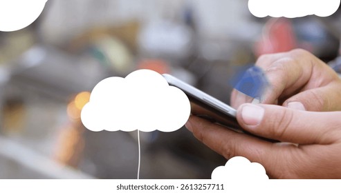 Image of digital clouds with icons over man using smartphone. global networks, connections, data storage and digital interface concept digitally generated image.