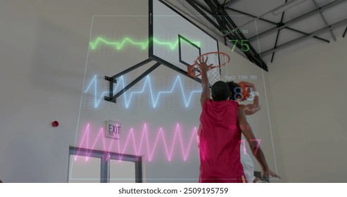 Image of digital data processing over diverse basketball players on court. Global sports, competition, connections, computing and data processing concept digitally generated image. - Powered by Shutterstock