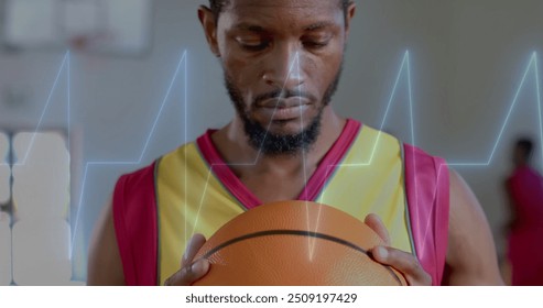 Image of digital data processing over african american basketball player on court. Global sports, competition, connections, computing and data processing concept digitally generated image. - Powered by Shutterstock