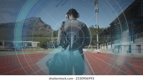 Image of digital data processing over disabled male athlete walking on racing track. global sports, competition, disability and digital interface concept digitally generated image. - Powered by Shutterstock