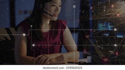 Image of digital data processing over asian businesswoman using phone headset. Global business, connections, computing and data processing concept digitally generated image.