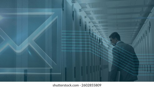 Image of digital envelope icon over man in tech room with computer servers. digital interface global connection concept digitally generated image.