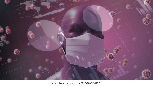 Image of a digital human head wearing a face mask with giant virus models floating on a dark background with charts and graphs. Coronavirus Covid-19 pandemic concept digital composite. - Powered by Shutterstock