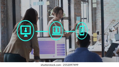 Image of digital icons and data processing over diverse business people in office. Global finance, business, connections, computing and data processing concept digitally generated image. - Powered by Shutterstock