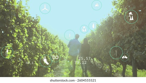 Image of digital icons and data processing over people embracing on field. global digital interface, data processing and technology concept digitally generated image.
