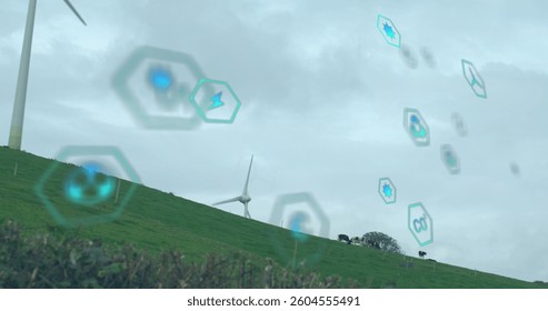 Image of digital icons over wind turbines. global digital interface, data processing and technology concept digitally generated image.