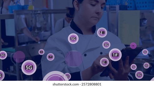 Image of digital icons processing over caucasian female cook using tablet. Global connections, computing and data processing concept digitally generated image.