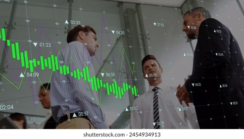 Image of digital interface and financial data processing over business people. global connections, business, digital interface, technology and networking concept digitally generated image.