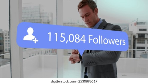 Image of digital interface Followers text and people icon with growing numbers on blue speech bubble over man using smartwatch. Global social media network digitally generated image. - Powered by Shutterstock