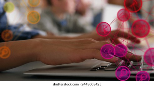 Image of digital interface with mail envelopes social media icons over person typing on laptop computer. Global digital social media network digitally generated image.