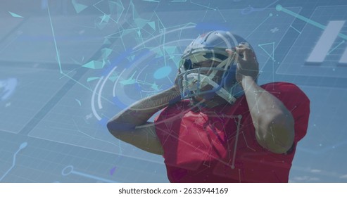 Image of digital interface over american football player. Global sports, digital interface and data processing concept digitally generated image.
