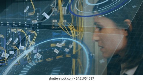Image of digital interface over server room. Global science, connections, data processing and digital interface concept digitally generated image.