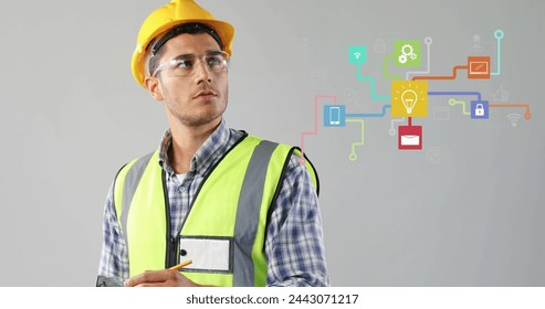Image of digital interface showing linked media icons over male engineer wearing safety helmet and glasses writing on a clipboard. Global digital network concept digitally generated image.