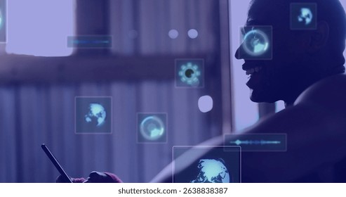 Image of digital screens with data over hands of african american man using smartphone. Data processing, digital interface and technology concept digitally generated image.