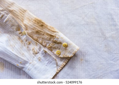 Image of dirty old white shirt