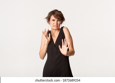 Image Of Disgusted Young Woman Cringe From Something Awful, Standing Over White Background