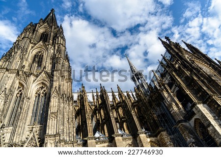 Image displaying the wonderful architectural detail of Cologne Cathedral against a blue sky