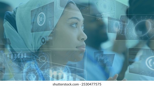 Image of diverse data on digital screen over biracial businesswoman clapping hands. Business, cooperation, communication and technology concept digitally generated image. - Powered by Shutterstock