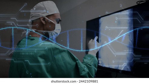 Image of dna strand and data processing over caucasian male surgeon in hospital. Global medicine, healthcare, connections, computing and data processing concept digitally generated image.