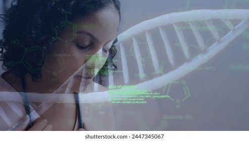 Image of dna strand and data processing over tired biracial female doctor. Global healthcare, science, medicine, research, computing and data processing concept digitally generated image.
