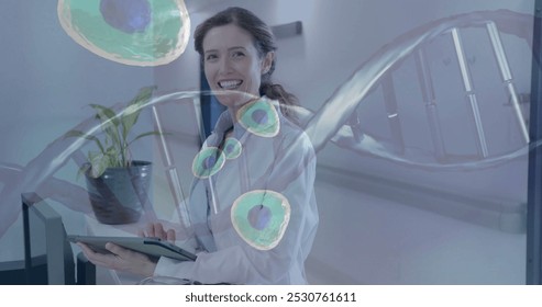 Image of dna strand and data processing over caucasian female doctor. Global medicine, connections, computing and data processing concept digitally generated image.